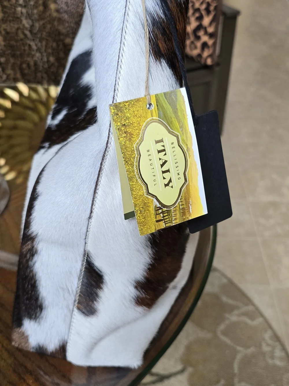 Cowhide Calvacanti Shoulder Tote in White and Chocolate Brown.